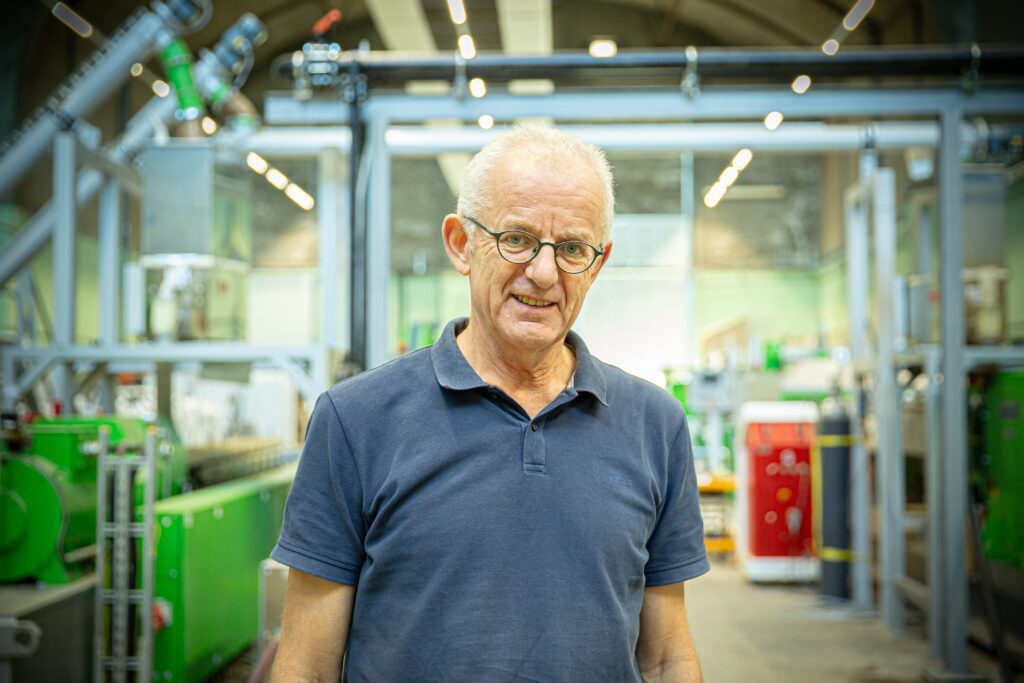 Man wearing blue polo shirt and glasses at Tyromer's Netherlands facility